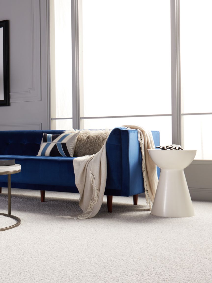 kids playing on newly installed Carpet One vinyl flooring in playroom